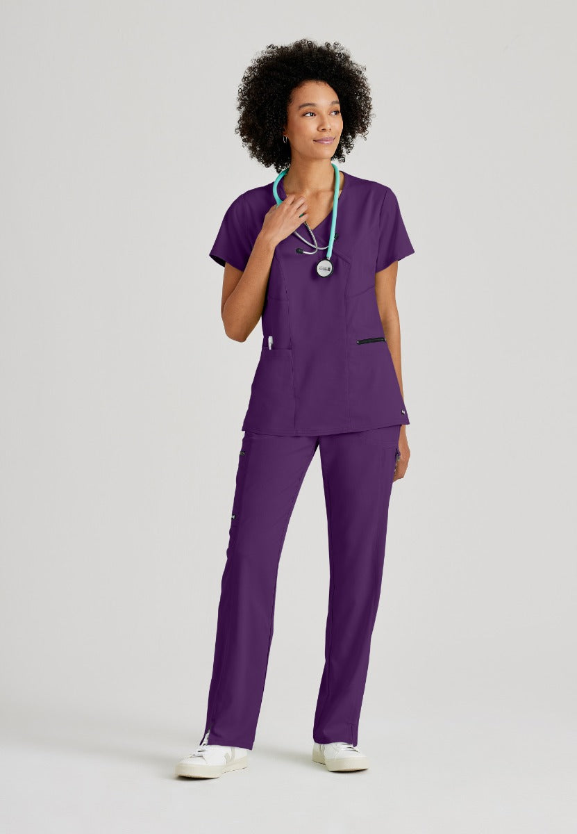 Greys Anatomy V-Neck Kim Top with Zip Front Pocket | Eggplant