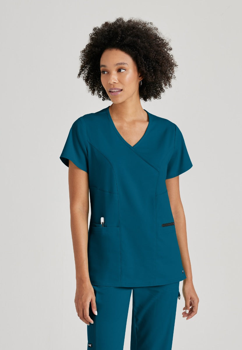 Greys Anatomy V-Neck Kim Top with Zip Front Pocket | Bahama