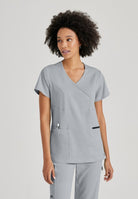 Greys Anatomy V-Neck Kim Top with Zip Front Pocket |  Moonstruck