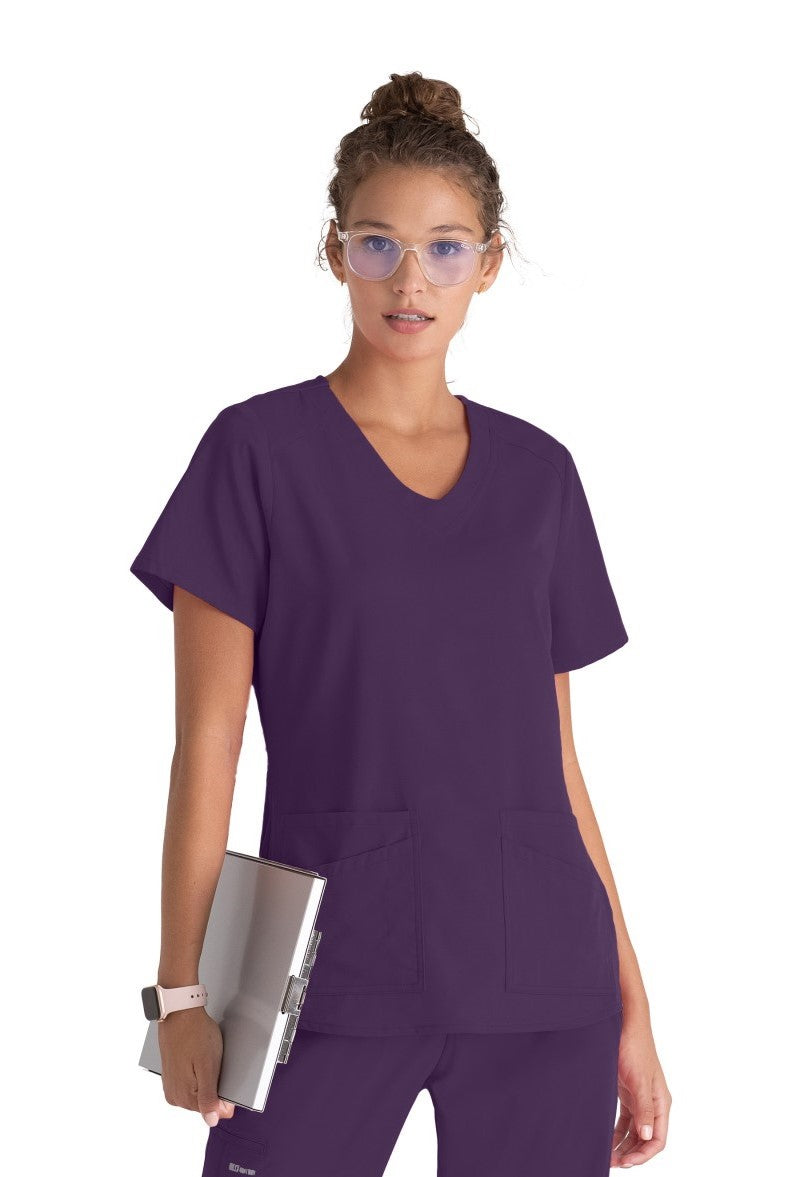 Greys Anatomy Emma 4 pocket, V-neck scrub top with angled seams | Eggplant