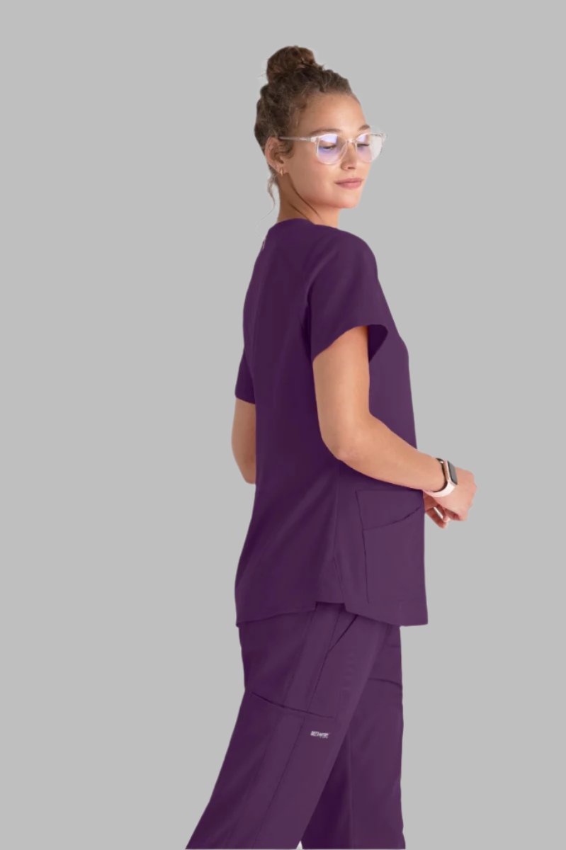 Greys Anatomy Emma 4 pocket, V-neck scrub top with angled seams | Eggplant