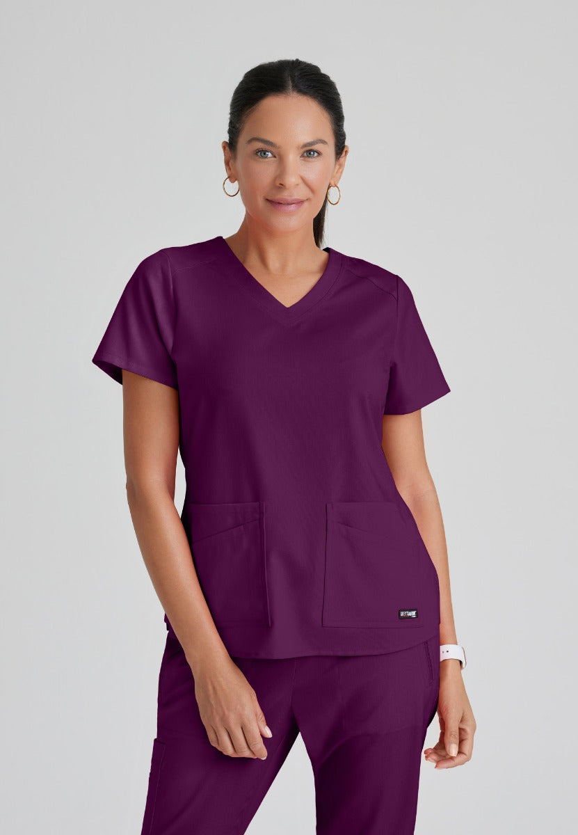 Greys Anatomy Emma 4 pocket, V-neck scrub top with angled seams | Wine