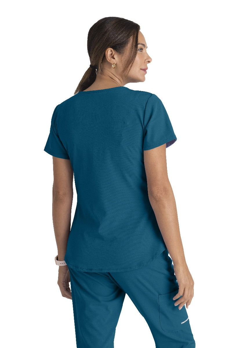 SKECHERS BREEZE 3-POCKET SHAPED HEM TOP | Bahama