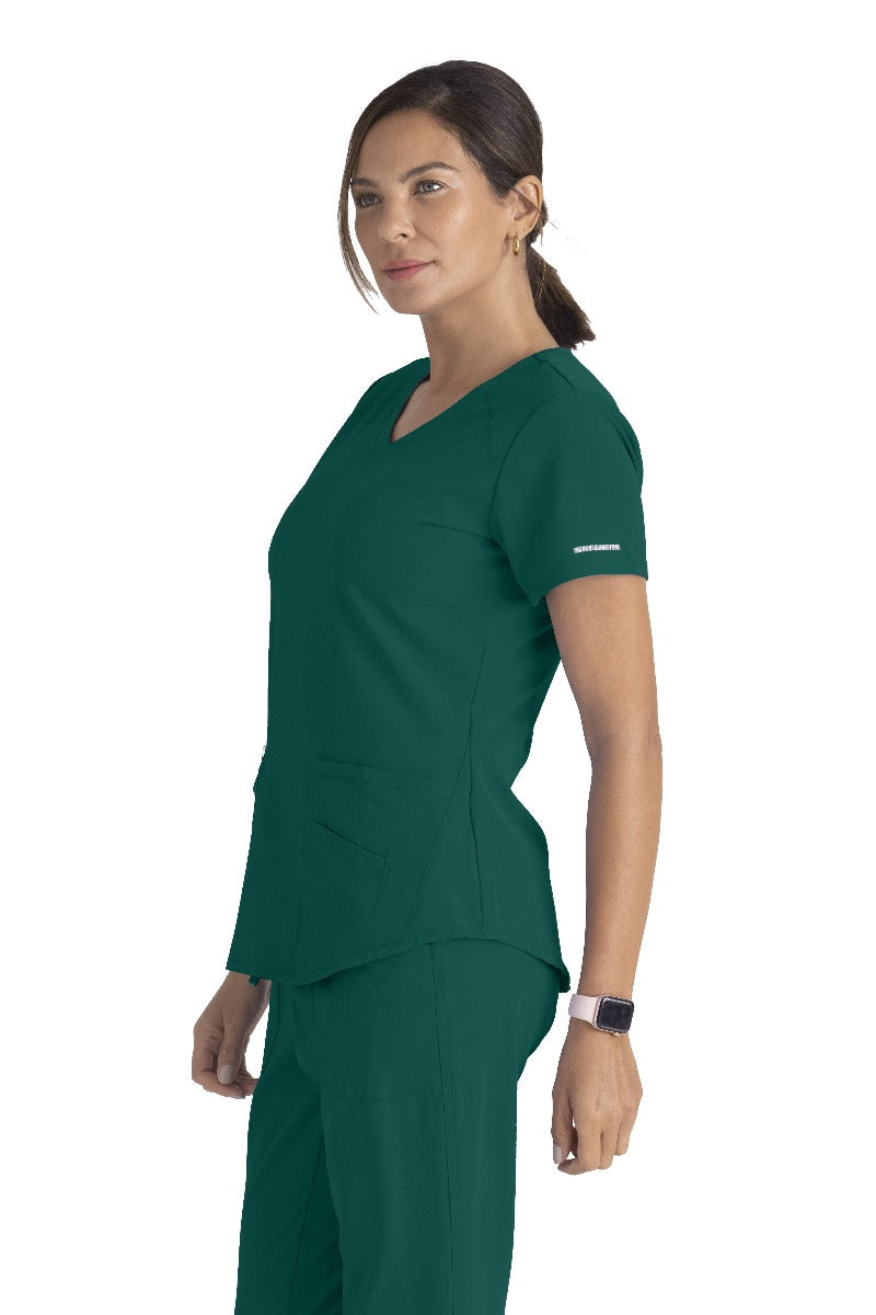 SKECHERS BREEZE 3-POCKET SHAPED HEM TOP | Hunter Green