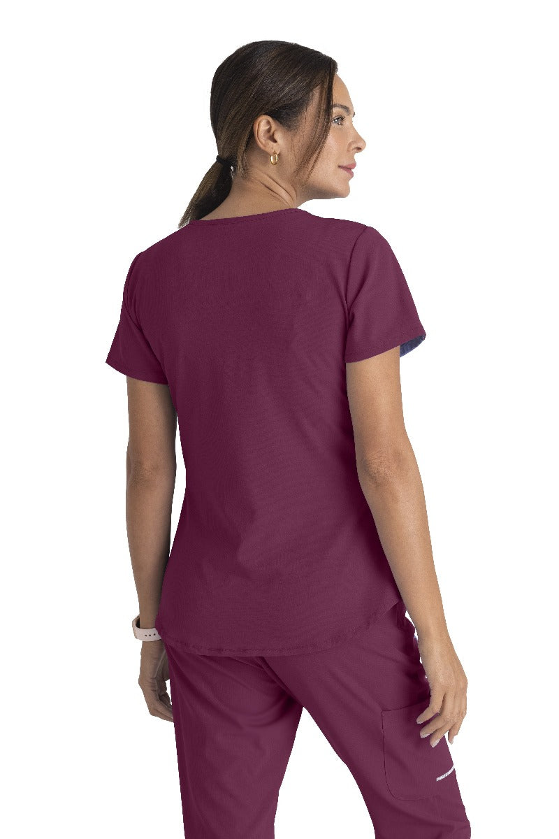 SKECHERS BREEZE 3-POCKET SHAPED HEM TOP | Wine